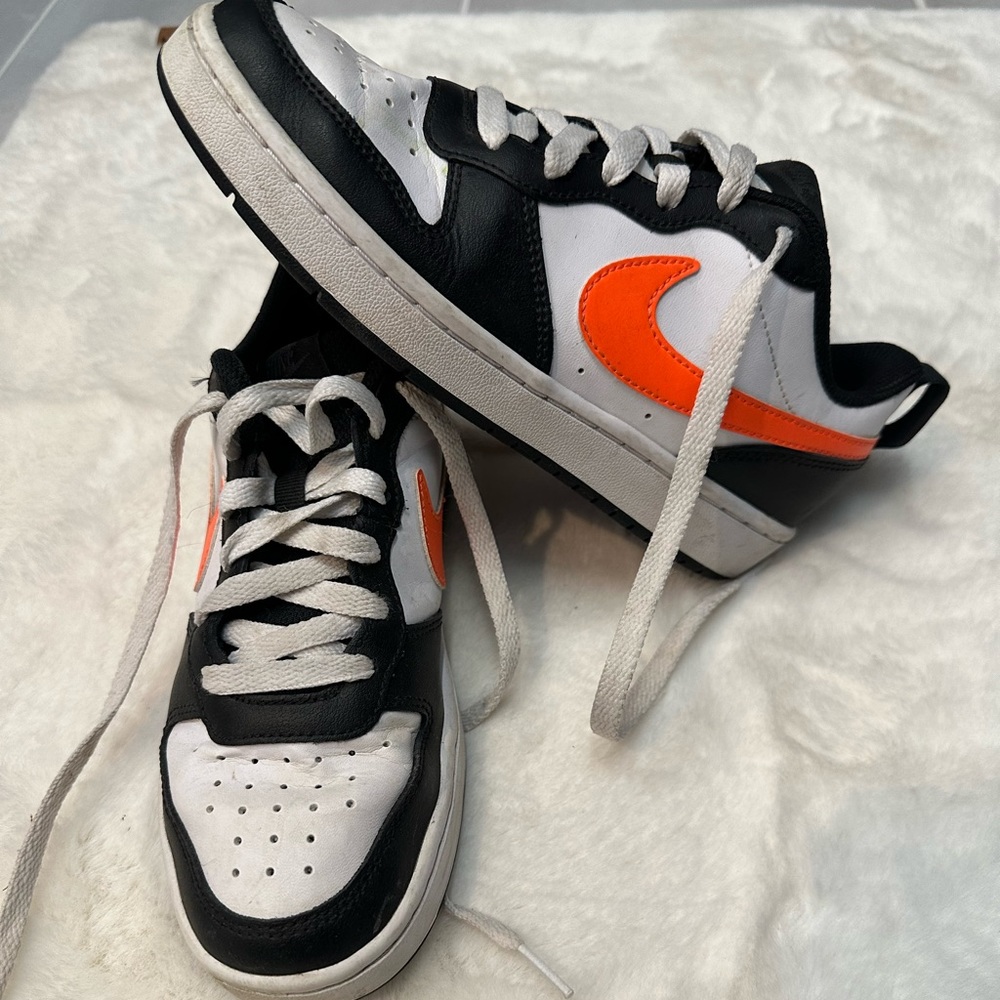 Black and orange children’s 4.5Y Nike dunks